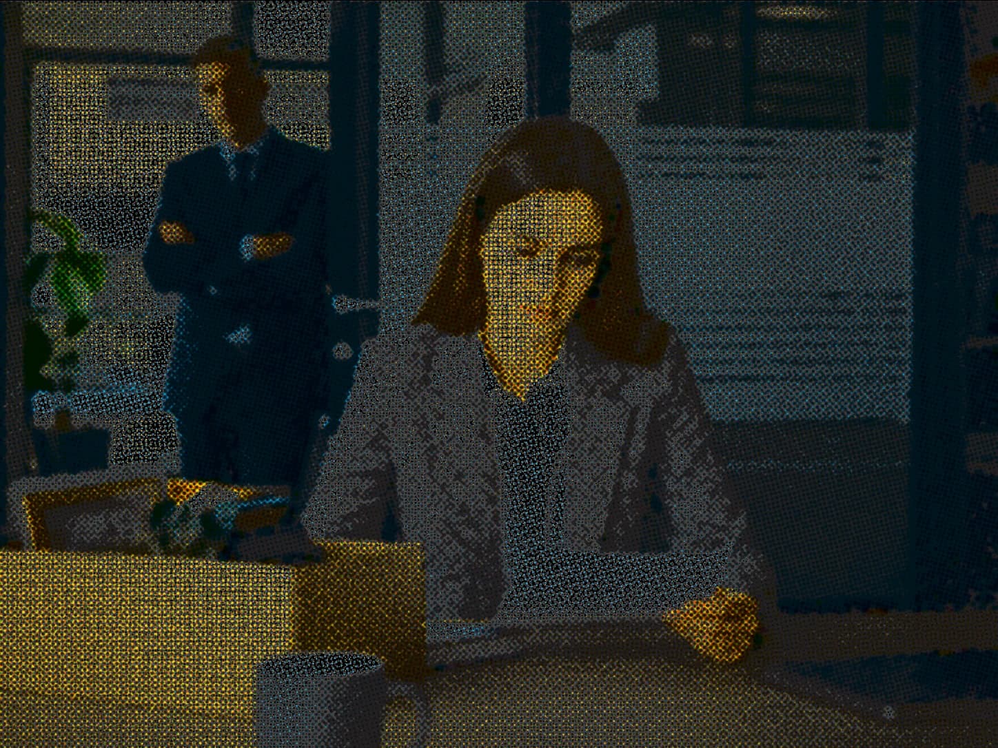 Employee reviewing a termination letter in an office